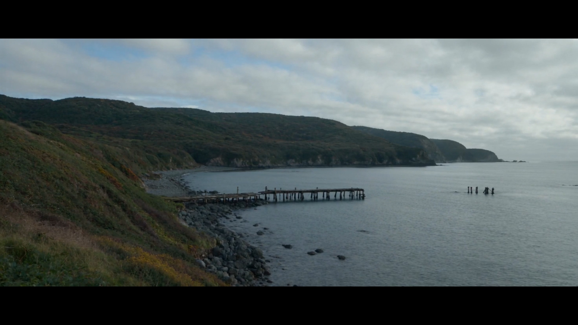 The Okinawan coastline with the pier reaching into the bay